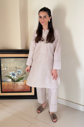 Breathable and lightweight linen fabric for everyday wear.