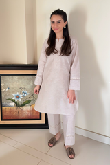 Breathable and lightweight linen fabric for everyday wear.